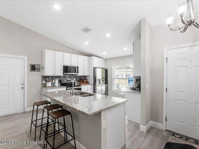 587 Plumbago Road NW, Palm Bay, FL 32907