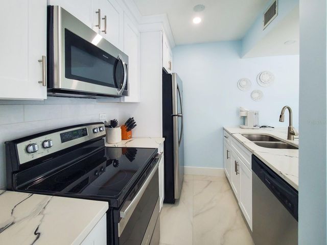 215 MEDALLION BOULEVARD G, Madeira Beach, FL 33708