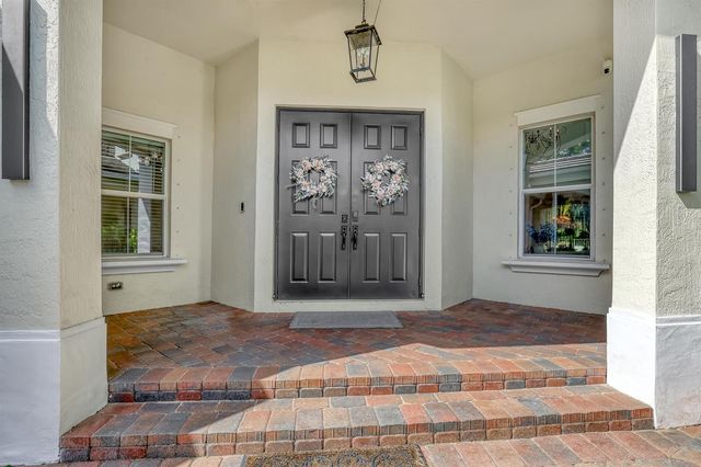 8541 Butler Greenwood Drive, Royal Palm Beach, FL 33411