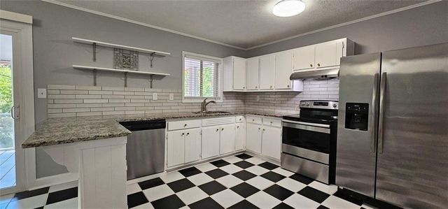 1096 Deleon Court, Clarkston, GA 30021