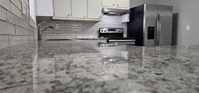 1096 Deleon Court, Clarkston, GA 30021