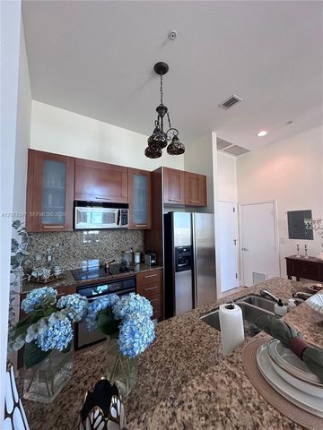 9066 SW 73 Court 703, Miami, FL 33156