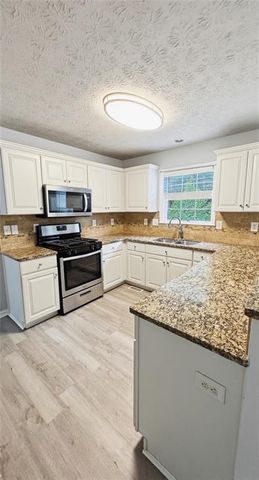 326 CANTERBURY PLACE Drive, Suwanee, GA 30024