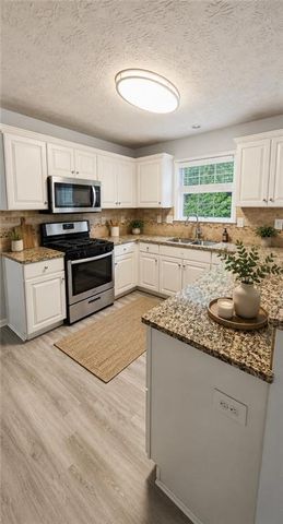 326 CANTERBURY PLACE Drive, Suwanee, GA 30024