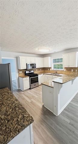 326 CANTERBURY PLACE Drive, Suwanee, GA 30024