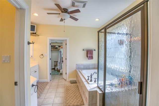 219 The Hills DR 5, The Hills, TX 78738