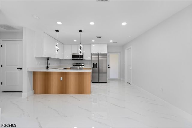 1055 Asther ST E, Lehigh Acres, FL 33974