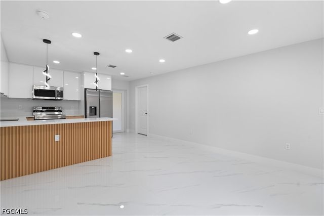 1055 Asther ST E, Lehigh Acres, FL 33974