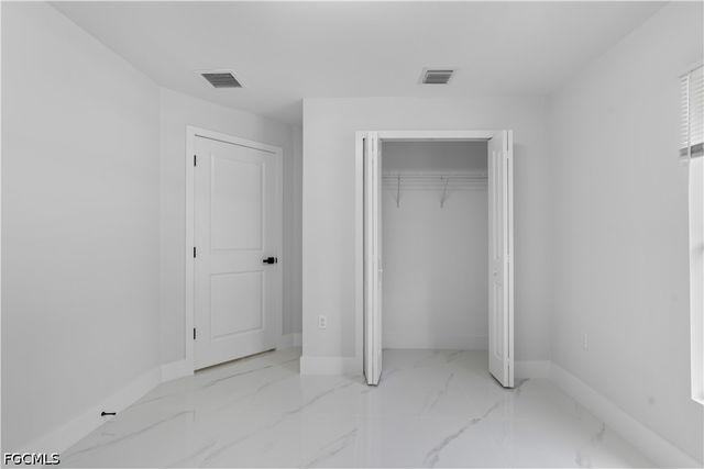 1055 Asther ST E, Lehigh Acres, FL 33974