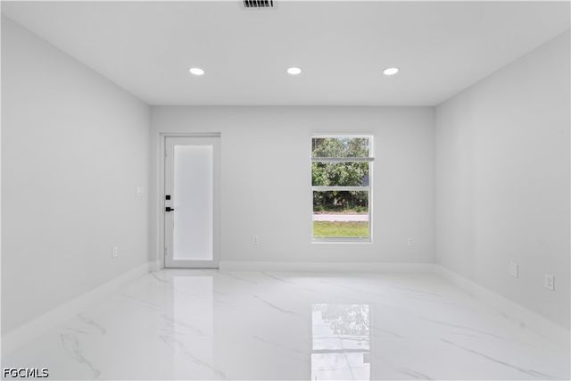 1055 Asther ST E, Lehigh Acres, FL 33974
