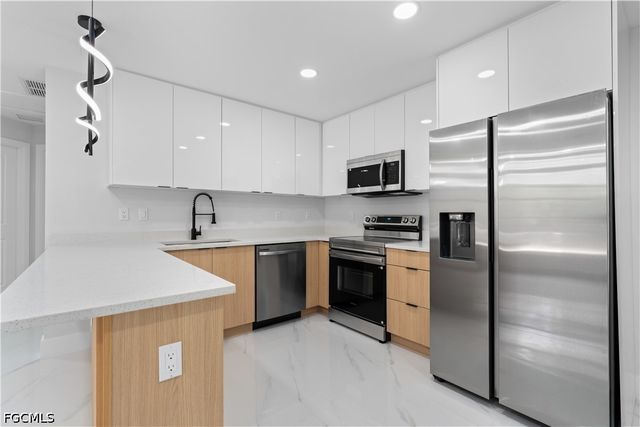 1055 Asther ST E, Lehigh Acres, FL 33974