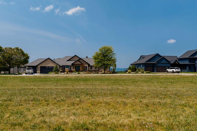 4182 Dornoch Court, Williamsburg, MI 49690