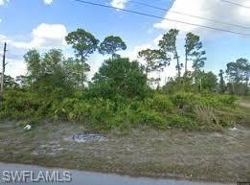 1058 Mansion AVE S, LEHIGH ACRES, FL 33974 — exterior