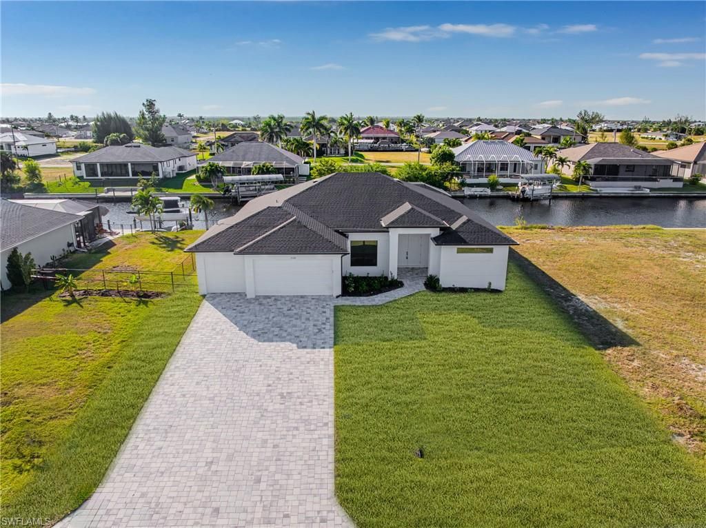 1438 NW 38th PL, CAPE CORAL, FL 33993 — photo 2