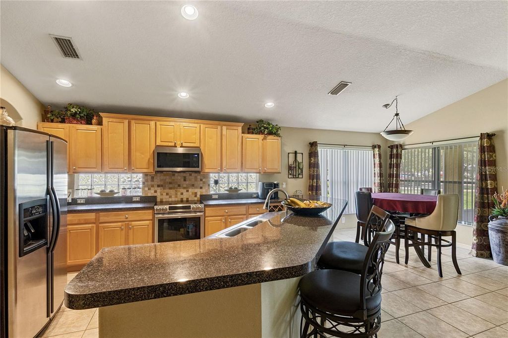 Image 9 of property listing at 4627 WHISPERING WIND AVENUE, Tampa, FL 33614