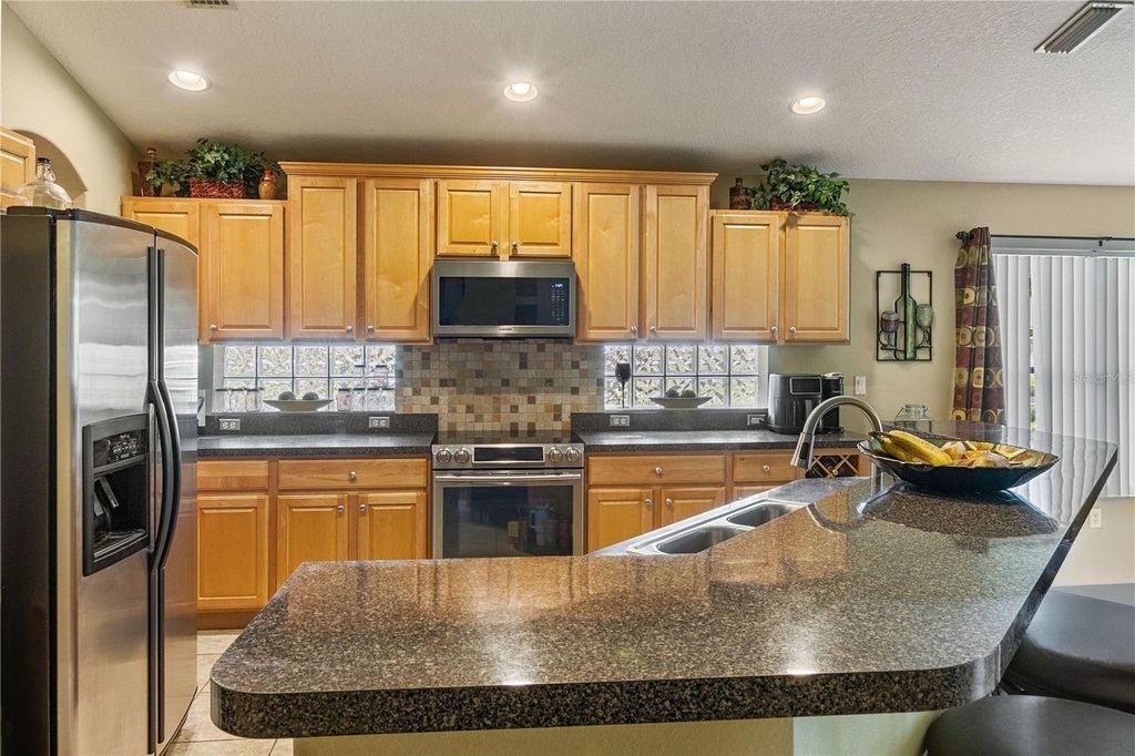 Image 10 of property listing at 4627 WHISPERING WIND AVENUE, Tampa, FL 33614
