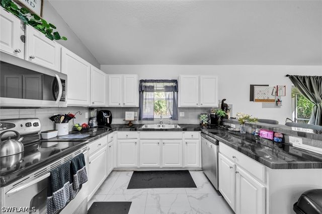 2071 20th AVE NE, Naples, FL 34120