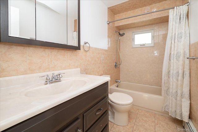 94 Pacific Street, Massapequa Park, NY 11762