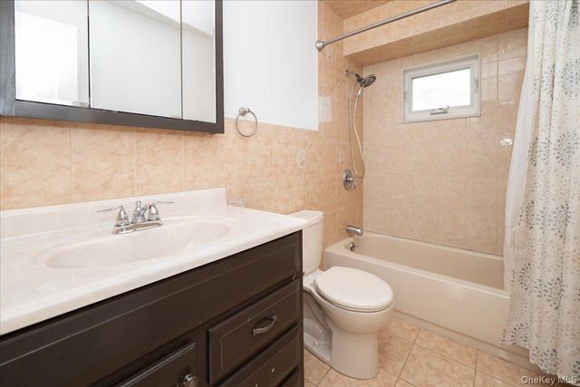 94 Pacific Street, Massapequa Park, NY 11762