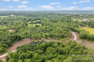 6230 WILDEN RIDGE Drive NE, Ada, MI 49301