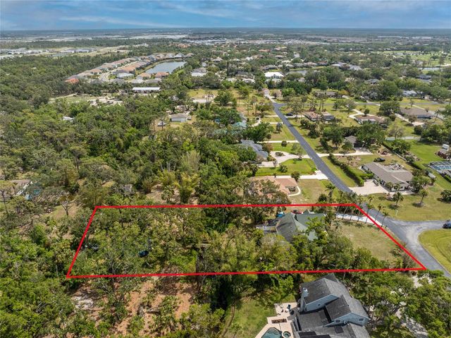 1828 WHISPERING PINES CIRCLE, Englewood, FL 34223