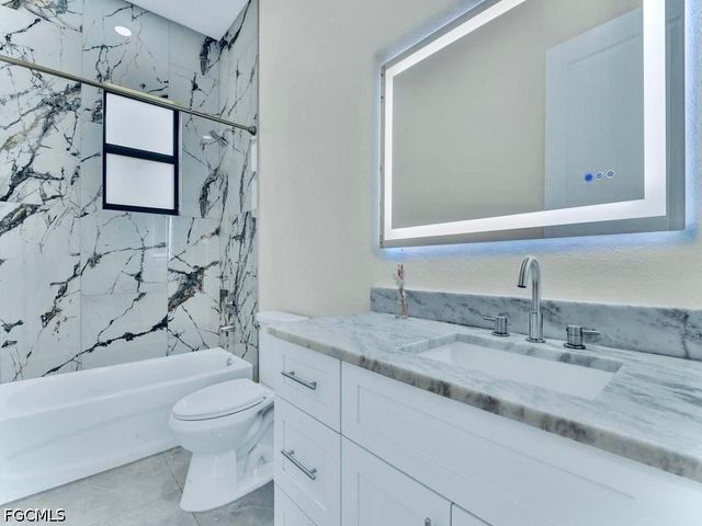 1023 Bank AVE S, Lehigh Acres, FL 33974