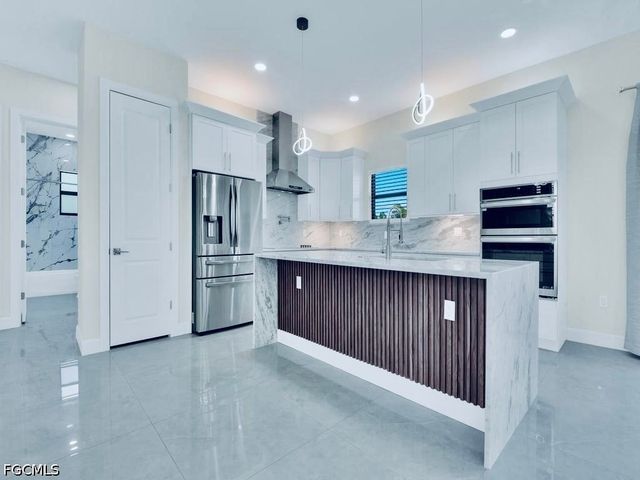 1023 Bank AVE S, Lehigh Acres, FL 33974