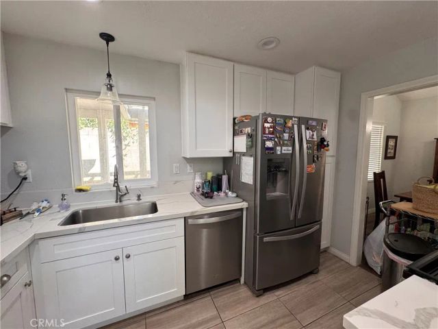 7707 Newcastle Court, Highland, CA 92346
