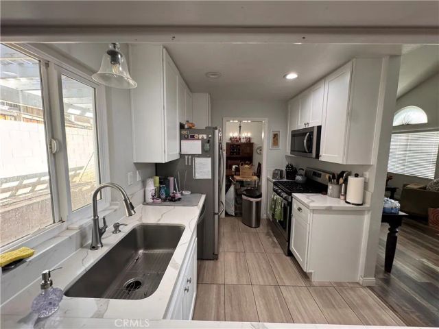 7707 Newcastle Court, Highland, CA 92346