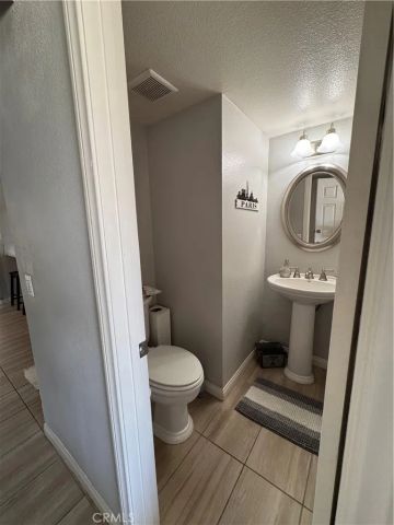 7707 Newcastle Court, Highland, CA 92346