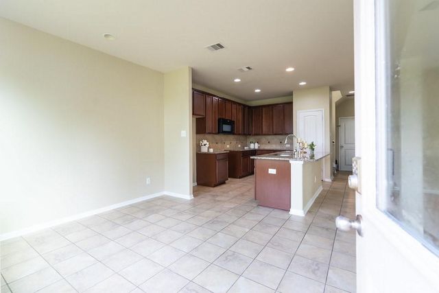 9408 Savannah Holly Drive, Houston, TX 77075