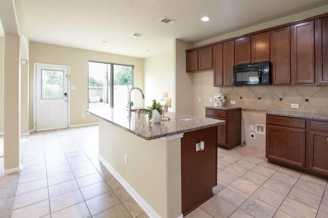 9408 Savannah Holly Drive, Houston, TX 77075