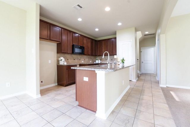 9408 Savannah Holly Drive, Houston, TX 77075