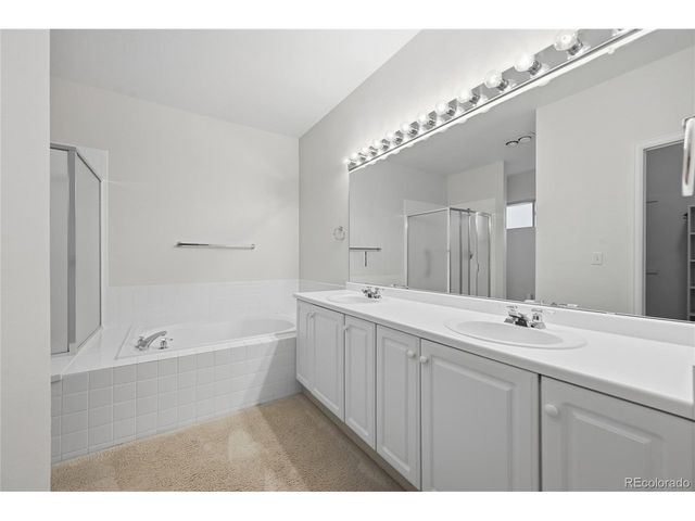 2243 S Yosemite Cir, Denver, CO 80231