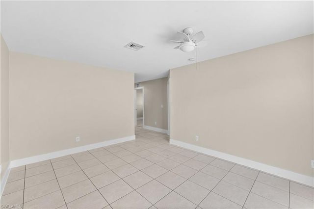 909 Jaguar BLVD, Lehigh Acres, FL 33974