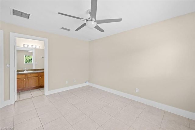 909 Jaguar BLVD, Lehigh Acres, FL 33974