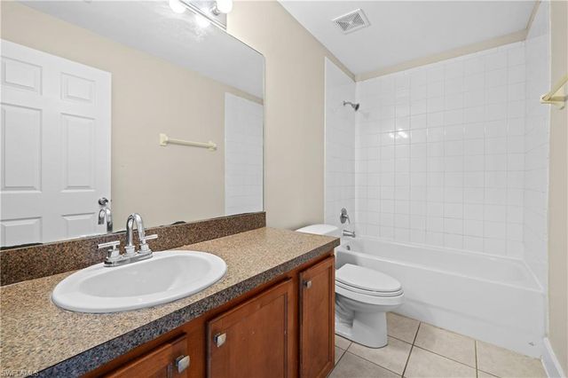 909 Jaguar BLVD, Lehigh Acres, FL 33974