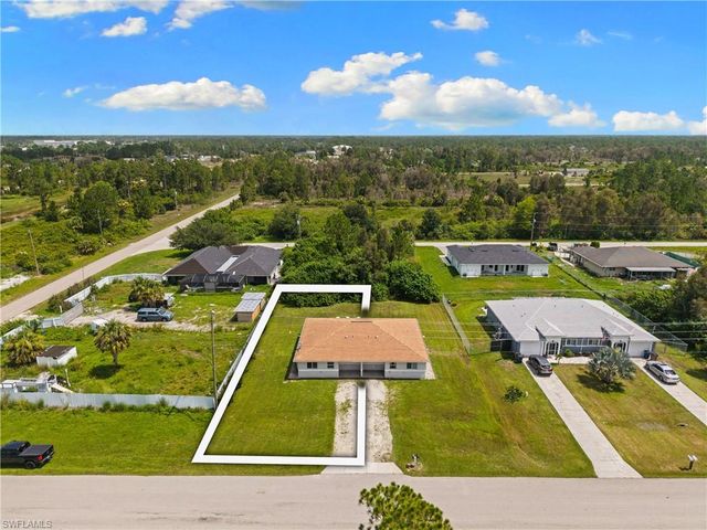 909 Jaguar BLVD, Lehigh Acres, FL 33974