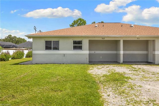 909 Jaguar BLVD, Lehigh Acres, FL 33974