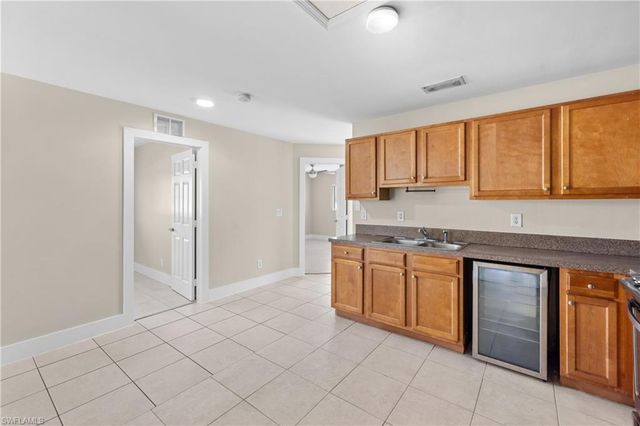 909 Jaguar BLVD, Lehigh Acres, FL 33974
