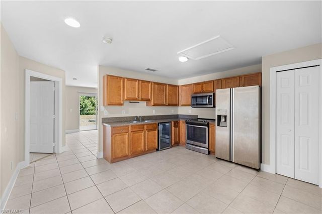 909 Jaguar BLVD, Lehigh Acres, FL 33974