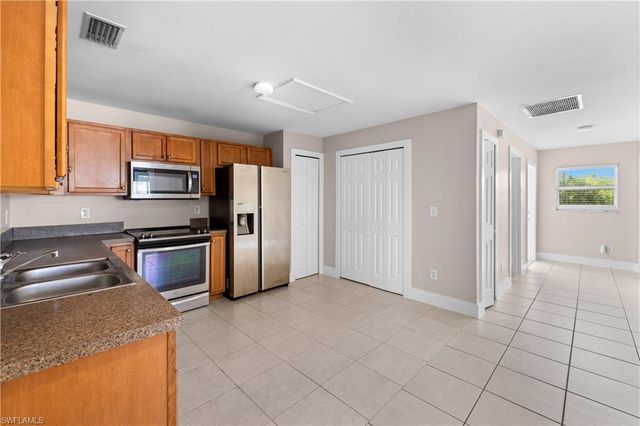 909 Jaguar BLVD, Lehigh Acres, FL 33974