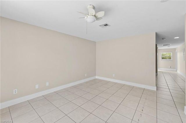 909 Jaguar BLVD, Lehigh Acres, FL 33974