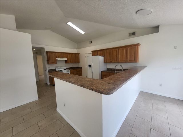 6913 LONG NEEDLE COURT, Orlando, FL 32822