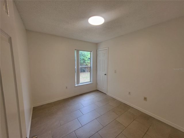 6913 LONG NEEDLE COURT, Orlando, FL 32822
