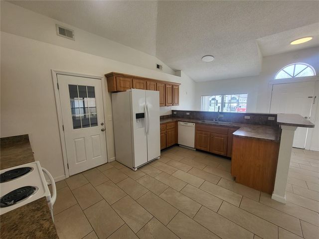 6913 LONG NEEDLE COURT, Orlando, FL 32822