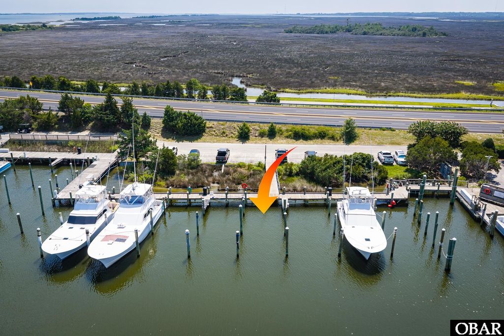 Image 1 of property listing at 12 Yacht Club Court Slip 12, Manteo, NC 27954