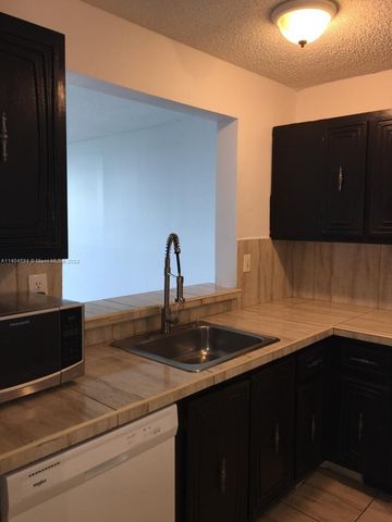 496 NW 165th St Rd D312, Miami, FL 33169