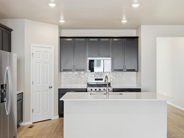 8906 Rifle St, Commerce City, CO 80022