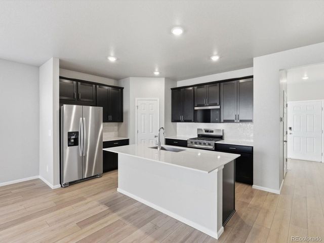 8906 Rifle St, Commerce City, CO 80022